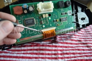 Remove the LCD flexible connector strip
